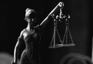 rechtvaardigheid oorzaak gevolg karma spirituele betekenis symboliek droom dromen